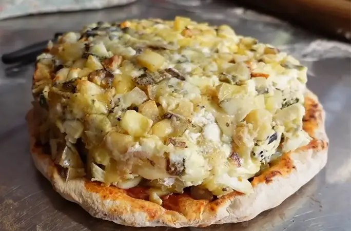 Cef buat piza guna lebih 1,000 jenis keju, pecah rekod dunia