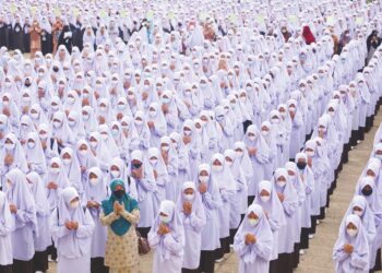 MASYARAKAT Melayu Pattani tetap teguh mempertahankan bahasa dan budaya Melayu serta pegangan akidah terhadap agama Islam. –  AFP
