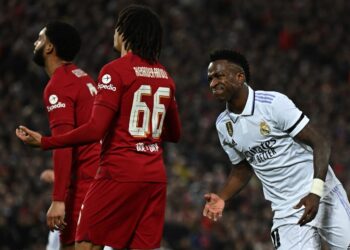 Penyerang Real Madrid, Vinicius Jr berjaya meledak dua gol ketika pasukannya membenam Liverpool dalam aksi pusingan 16 terbaik Liga Juara Juara Eropah di Anfield sebentar tadi. (Foto: AFP)