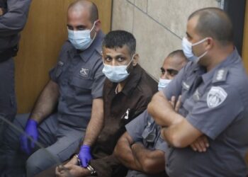 MOHAMMAD al-Ardah ketika dihadapkan ke Mahkamah Majistret di Nazareth. – AFP