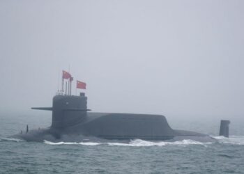 KAPAL selam nuklear jenis 094A milik tentera China mengambil bahagian dalam latihan ketenteraan di perairan berhampiran Qingdao di wilayah Shandong di timur China pada 2019. -AFP