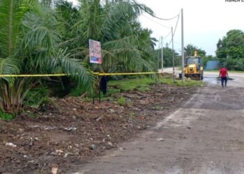 KAWASAN di tepi Jalan Segenting, Pulau Carey di Kuala Langat, Selangor ditutup oleh MPKL dengan pita kunings selepas dibersihkan bagi melarang pihak tidak bertanggungjawab membuang sampah secara haram di sana. - UTUSAN / ABDUL RAZAK IDRIS