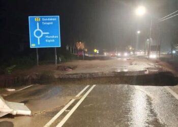 LALUAN utama Kota Kinabalu-Sandakan terputus akibat hujan lebat semalam