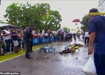 LUIS Carlos Chia merempuh isterinya, Claudia Roncancio di garisan penamat selepas meraih kemenangan dalam jelajah berbasikal Vuelta a Colombia. - TWITTER