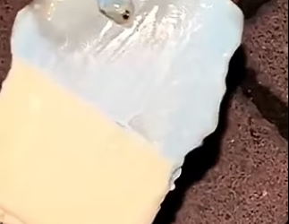 TANGKAP layar video menunjukkan aiskrim jenama Chicecream tidak cair apabila dicucuh dengan api. - AGENSI