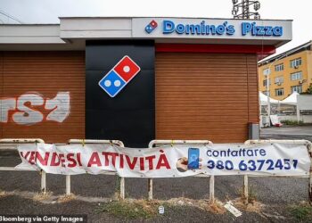 SEBUAH cawangan Domino's Pizza yang ditutup di Rom, Itali. - BLOOMBERG