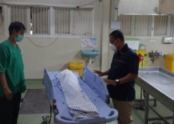 JENAZAH mangsa di hospital selepas menjalani bedah siasat. - AGENSI