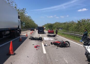 MUHAMMAD SHAHRUL Fadzli Jemahal maut digilis lori dalam kemalangan di kilometer 176.6 PLUS arah utara berhampiran Jasin, Melaka. - UTUSAN/DIYANATUL ATIQAH ZAKARYA