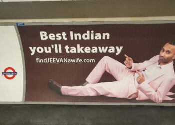 JEEVAN BHACHU mengiklankan dirinya di papan iklan stesen kereta api di London.-MEDIA SOSIAL