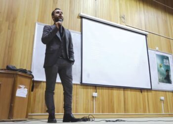 FADI Al-Halabi bercakap di atas pentas selepas tayangan filem yang dicalonkan Oscar, 'Last Men in Aleppo' di sebuah universiti di Idlib, Syria pada 12 Februari 2018. -AFP