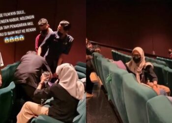 TANGKAP layar video menunjukkan pengunjung wanita itu ditenangkan rakannya sebelum dibawa keluar oleh petugas panggung wayang. - AGENSI