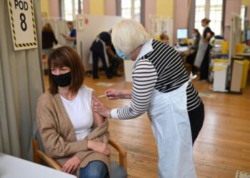 PENDUDUK menerima suntikan vaksin Covid-19 di Hospital Babington di Belper, United Kingdom (UK) - AFP