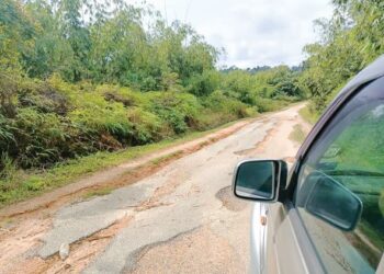 KEADAAN laluan ke Kampung Belau-Pos Senderut- Kampung Labu di Cameron Highlands. Pahang yang perlu dibaiki segera. - UTUSAN/SALEHUDIN MAT RASAD