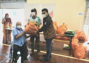 Semua pihak termasuk orang ramai diminta tidak meminggirkan golongan OKU dengan membantu meringankan bebanan mereka. – GAMBAR HIASAN/UTUSAN