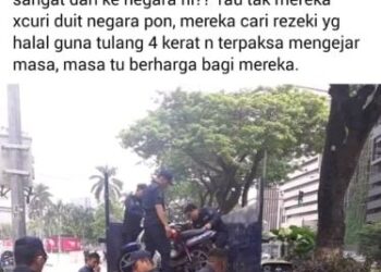 Gambar yang tular di laman media sosial menunjukkan penguat kuasa PBT mengangkut motosikal penghantar makanan.