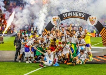 SEVILLA merangkul kejuaraan Liga Europa buat kali ketujuh.