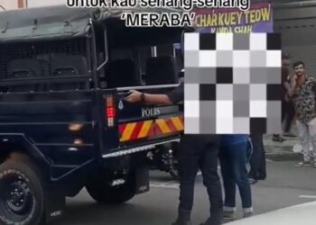 TANGKAP layar video tular lelaki disyaki meraba wanita di tapak pasar malam yang ditahan polis di Taman Perpaduan di Ipoh semalam. - UTUSAN