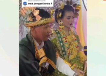 TANGKAP layar video majlis perkahwinan Ahmad Adsyah di perkampungan Campalagian di Sulawesi Barat minggu lalu.-AGENSI