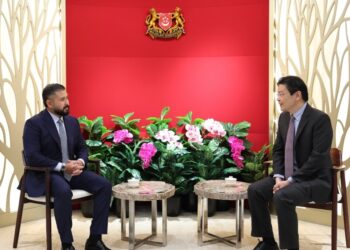TUNKU ISMAIL SULTAN IBRAHIM mengadakan pertemuan dengan Lawrence Wong di Singapura.