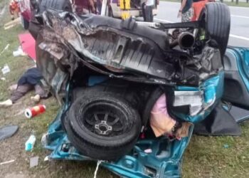 KEADAAN kereta Proton Wira yang remuk selepas terbalik dalam kemalangan di Kilometer 375.8, LPT2 berhampiran Bukit Besi, Dungun, semalam.