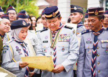 PERSEKUTUAN Pengakap Malaysia (PPM) di bawah kepimpinan Mohd. Zin Bidin (tengah) menggariskan 11 fokus utama hala tuju pengakap negara. – IHSAN EDWIN LAM