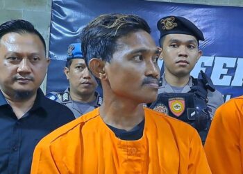 TASRI ditahan di Ibu Pejabat Polis Pelabuhan Makassar kelmarin.-AGENSI