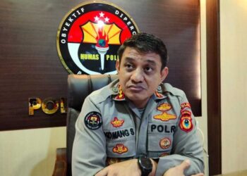 KOMANG SUARTANA