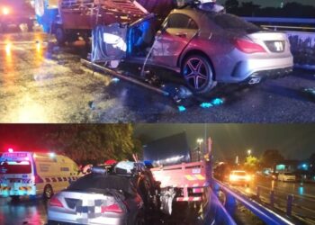 KEADAAN kemalangan melibatkan sebuah kereta jenis Mercedes Benz yang merempuh belakang lori yang menyebabkan dua maut manakala seorang lagi cedera dalam kejadian di Bukit Mertajam, Pulau Pinang awal pagi tadi. - Pic: IHSAN JBPM PULAU PINANG