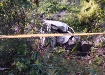 KEADAAN lokasi kemalangan membabitkan sebuah kenderaan dan individu yang dilaporkan hilang sejak Jun lalu yang kemudian ditemukan di Jalan Juasseh-Bahau, Kuala Pilah malam semalam.-UTUSAN/NOR AINNA HAMZAH.