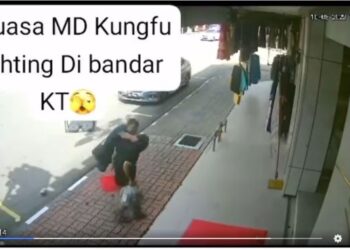 RAKAMAN video tular seorang lelaki berpakaian uniform lengkap memukul kepala dan menyepak seorang lelaki baru-baru ini.