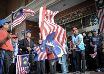 RAMKARPAL Singh ketika perlepasan peserta "Briskwalk" Merdeka 2023 dan Sambutan Jalur Gemilang di Bangunan Hal Ehwal Undang-undang Putrajaya. - UTUSAN/FAIZ ALIF ZUBIR