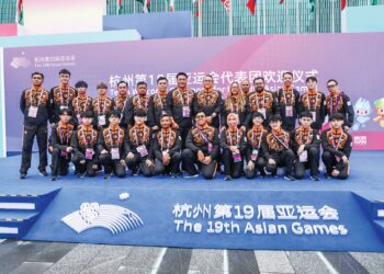 SEBAHAGIAN pegawai dan atlet negara yang hadir dalam Majlis Sambutan Ketibaan Kontinjen di Perkampungan Atlet, Hangzhou kelmarin. _ MAJLIS SUKAN NEGARA