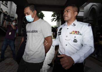 MUHAMMAD Izzatul Shafik Mozahari ketika hadir di Mahkamah Majistret, Putrajaya. - UTUSAN/FAISOL MUSTAFA