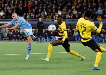 ERLING Haaland menyempurnakan sepakan penalti ketika membantu Manchester City mengalahkan Young Boys dalam saingan Liga Juara-Juara di Bern.
