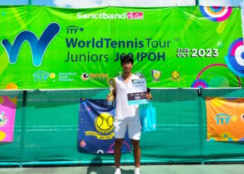 KIM Juan muncul juara perseorangan lelaki Kejohanan Tenis ITF World Tennis Tour Juniors J60 di Arena Tenis Perak di Ipoh hari ini. - UTUSAN
