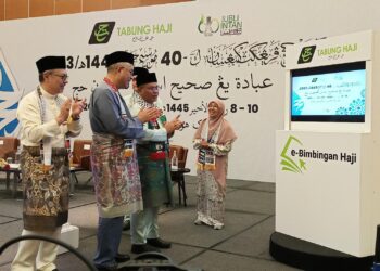 MOHD. Na'im Mokhtar melancarkan aplikasi e-Bimbingan Haji di Sepang, Selangor. - UTUSAN/AMREE AHMAD