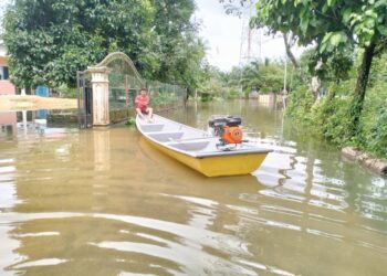BOT yang dibeli Mohd. Saiful Anuar Ismail kini dapat digunakan ahli keluarga ketika banjir melanda Kampung Serongga, Pasir Mas, Kelantan. - UTUSAN/ROHANA ISMAIL