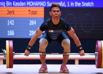 Mohamad Aniq Kasdan akan bertanding dalam kategori 61 kilogram pada Kejohanan Angkat Berat Dunia di Phuket, Thailand hari ini. - AFP