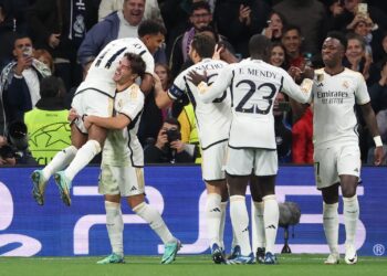 PEMAIN-Pemain Real Madrid meraikan jaringan Rodrygo ketika  menentang FC Braga dalam aksi Kumpulan C Liga Juara-Juara di Stadium Santiago Bernabeu awal pagi tadi.-AFP