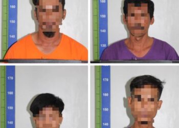SEBAHAGIAN daripada warga asing yabg ditahan dalam serbuan ke atas sebuah rumah di Felda Adela, Kota Tinggi.