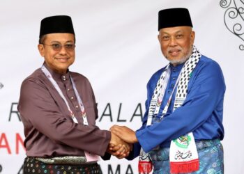 DR. AHMAD SAMSURI MOKHTAR dan RAJA MOHAMED AFFANDI RAJA MOHAMED NOOR
