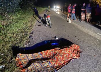 MAYAT salah seroang mangsa kemalangan di Kilometer 27, Jalan Gua Musang-Limau Kasturi, Gua Musang, Kelantan.-IHSAN PDRM