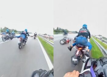 TANGKAP layar video memaparkan aksi remaja menunjukkan aksi ' Superman' di LPT1 yang tular dalam media sosial pada 24 Disember lepas. - MEDIA SOSIAL