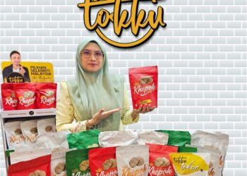 NURUL Hana Nordin menunjukkan produk makanan berasaskan ikan yang dikeluarkan oleh Tokku Leko.