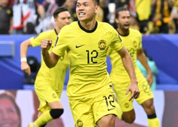 AKSI Arif Aiman Hanapi bersama skuad B-23 kebangsaan dalam  Piala Asia B-23 mungkin tidak  menjadi kenyataan. - AFP