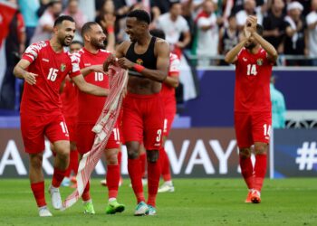 PEMAIN-Pemain Jordan meraikan kejayaan mara ke separuh akhir Piala Asia 2023.-AFP