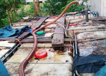 TANGKI yang digunakan untuk menyorok diesel di Kampung Sungai Petai, Pasir Puteh, Kelantan.