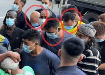 TIGA daripada lima anggota MPV (dalam bulatan merah) ketika dibawa ke Mahkamah Majistret Bukit Mertajam, Pulau Pinang. UTUSAN / SITI NUR MAS ERAH AMRAN