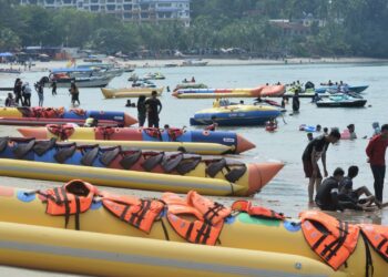 PORT DICKSON yang terkenal dengan pantai-pantai peranginannya diiktiraf sebagai salah satu daripada 10 bandar paling bahagia di negara ini pada tahun ini.-UTUSAN/MOHD. SHAHJEHAN MAAMIN.