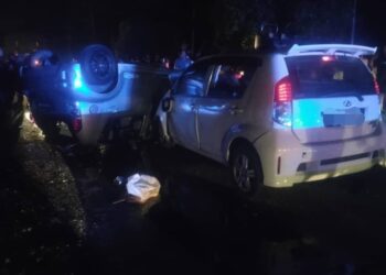KEADAAN Kereta Produa Myvi yang dipandu Chin Sio Mei dan Mohammad Ariff Azeem Ahmad selepas bertembung dalam kemalangan di Kilometer 103, Jalan Johor Bahru - Melaka berhampiran Tanjung Labuh di Batu Pahat malam tadi.